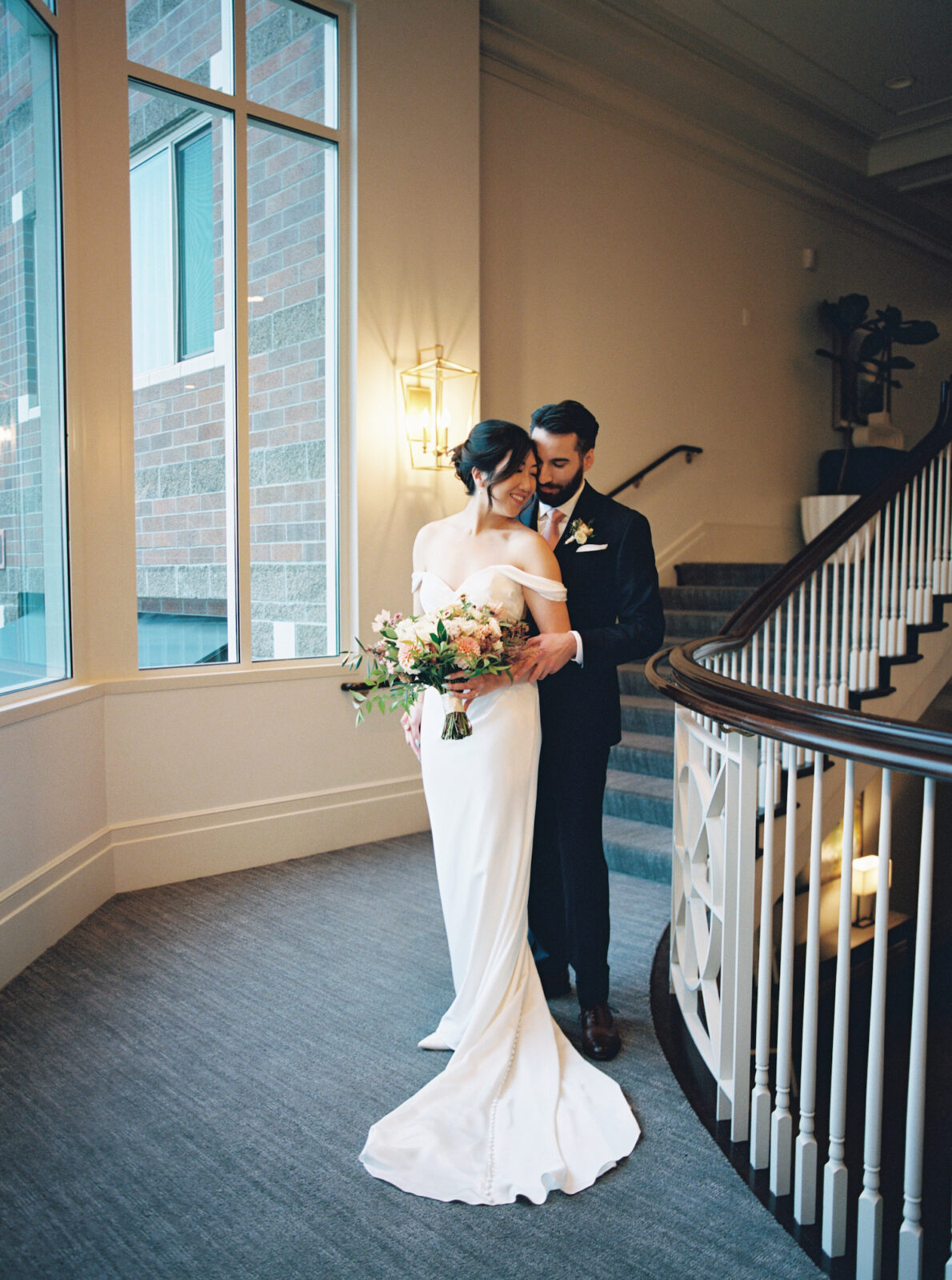 woodmark hotel kirkland wedding staircase portraits 