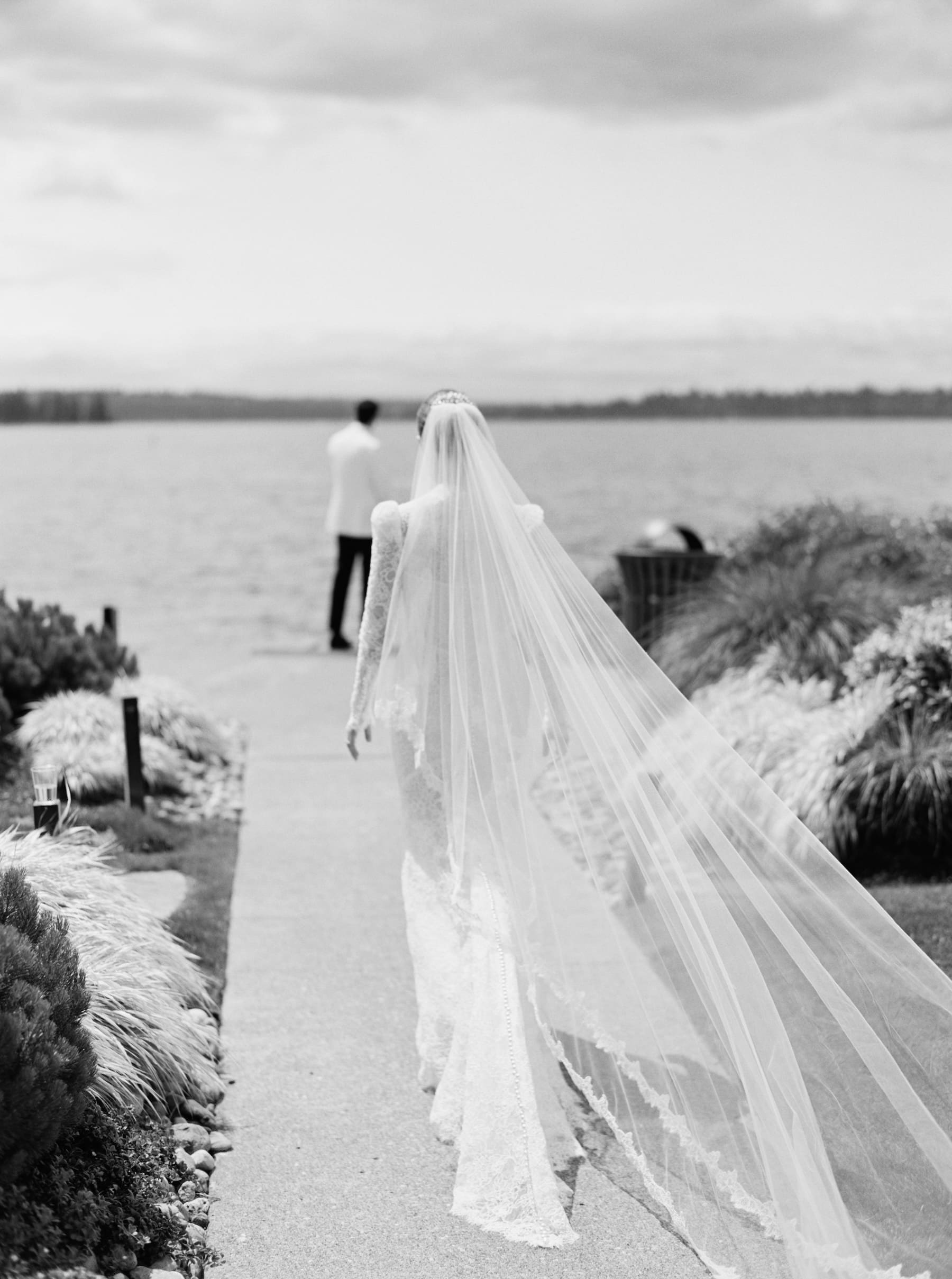 Bride at waterfront Woodmark Hotel wedding photography scene