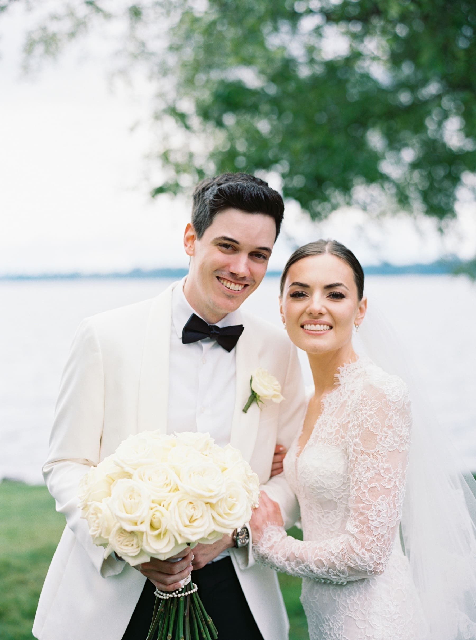 Bride and groom smiling at Woodmark Hotel wedding photography