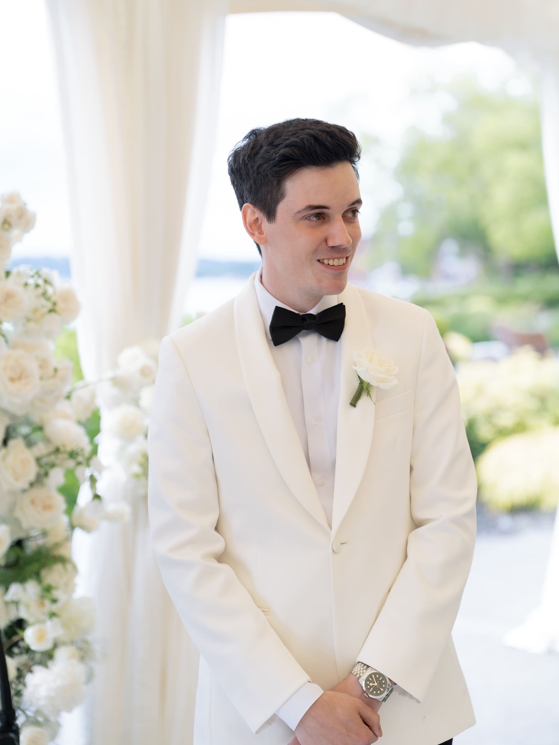 groom watching bride walk down the aisle at their woodmark hotel wedding
