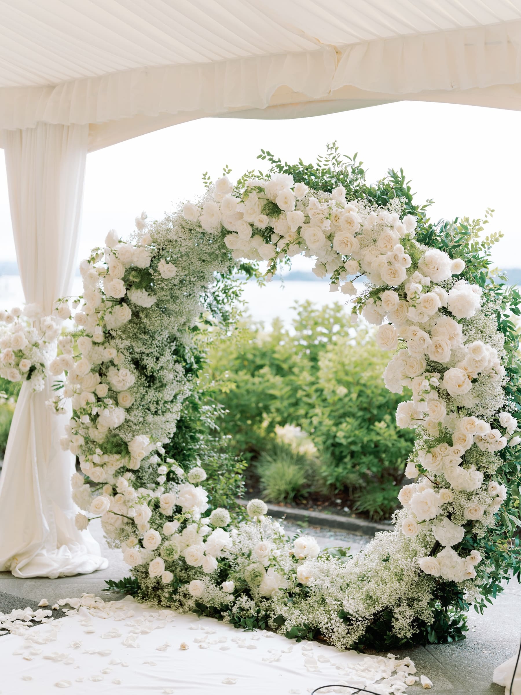 white floral arch by Seattle Floral Design