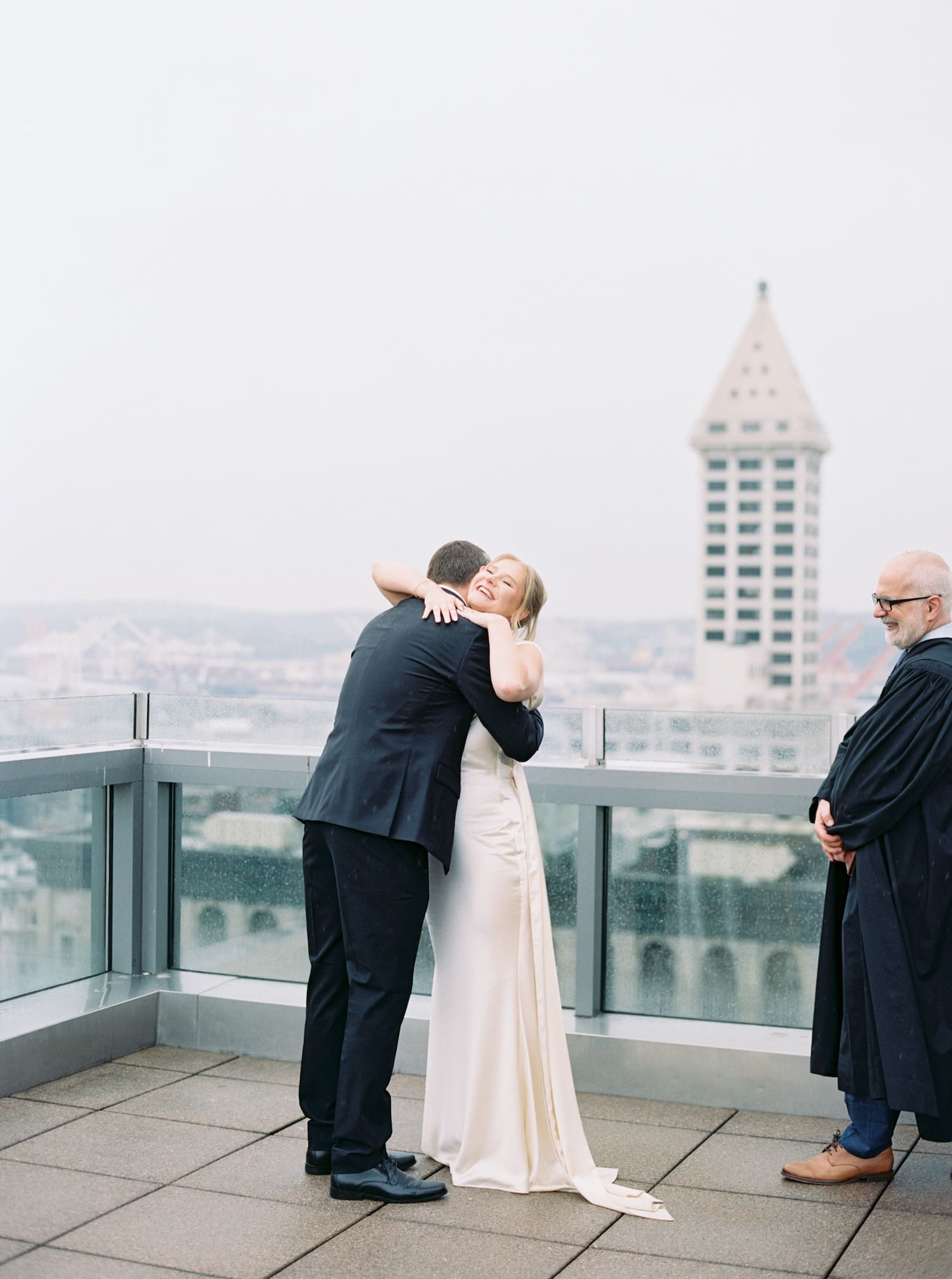 romantic film photography for this rooftop seattle courthouse elopement 