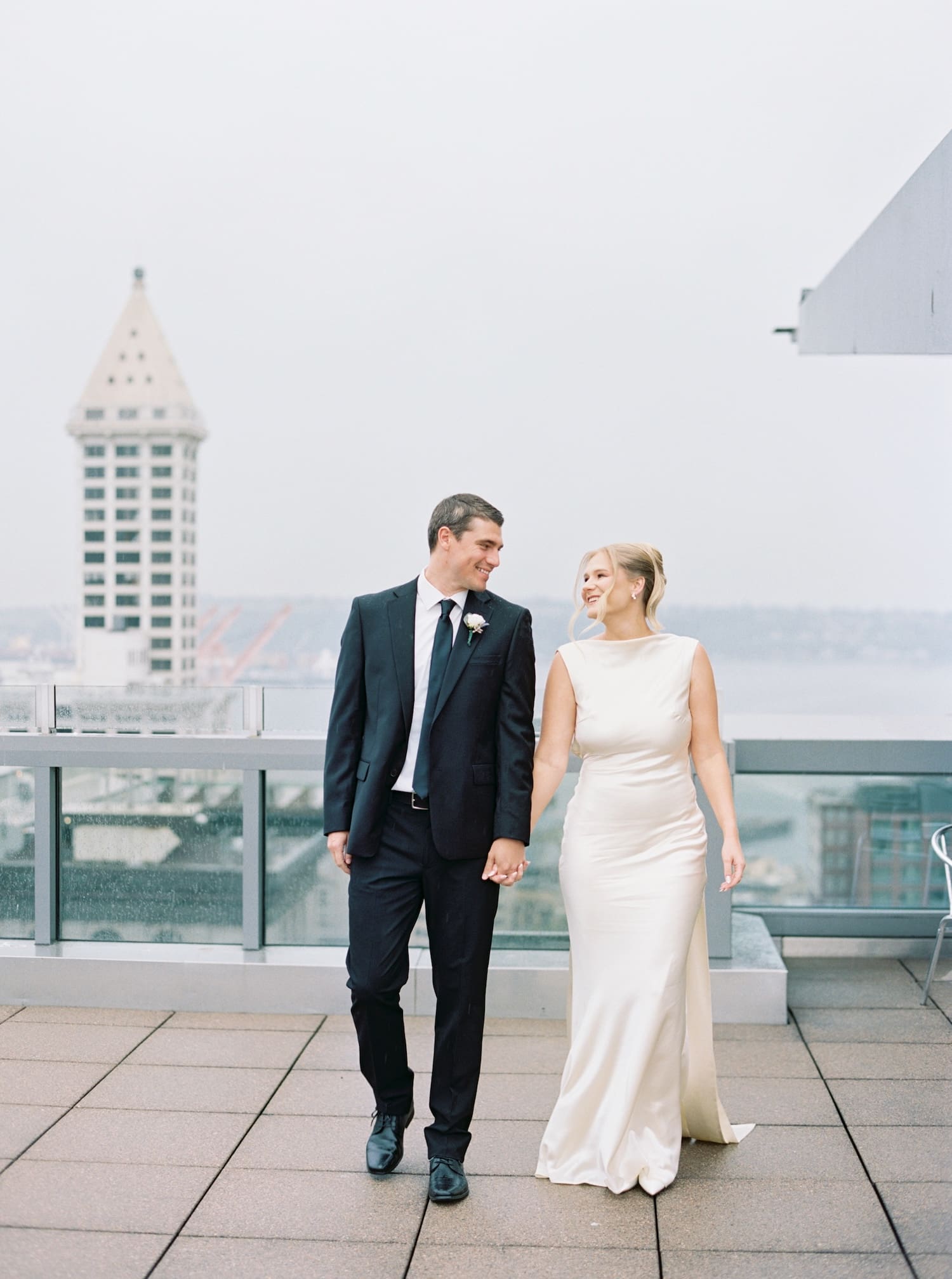 romantic film photography for this rooftop seattle courthouse elopement 